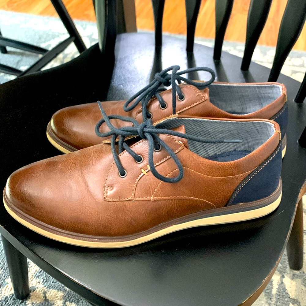 Boys size 7 brown leather dress shoes, navy laces and accents. Very nice.